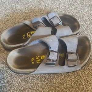 Tan women’s Birkenstock slip-on sandal